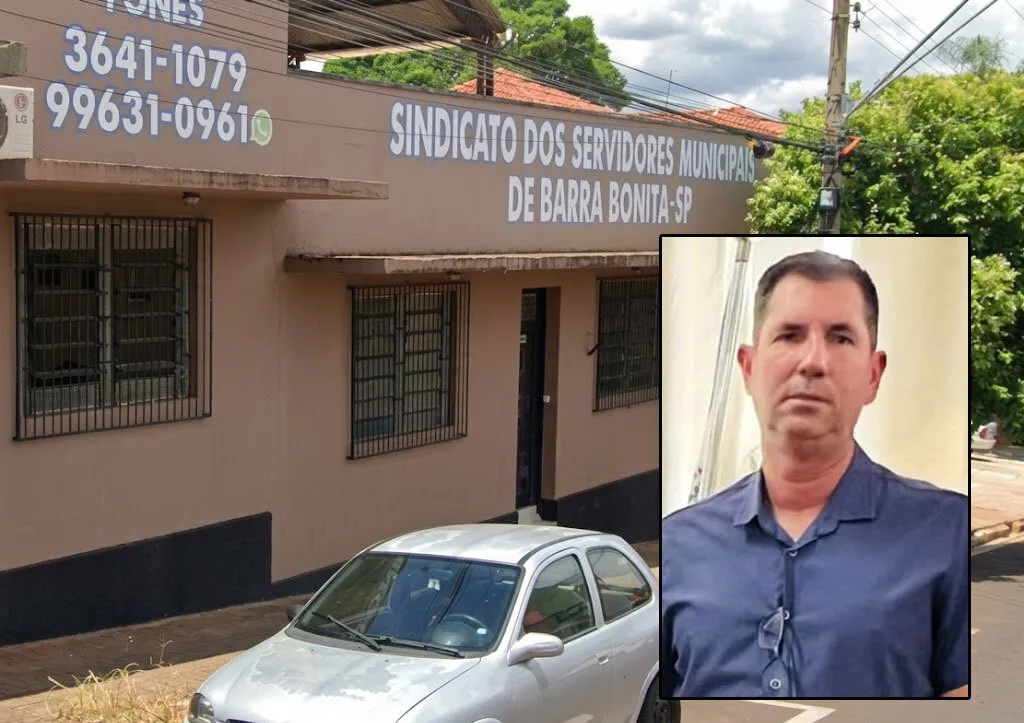 Prédio comercial na cor marrom, com um veículo estacionado em frente, tendo na fachada os dizeres Sindicato dos Servidores Públicos Municipais, com foto em detalhe de um homem de camisa azul